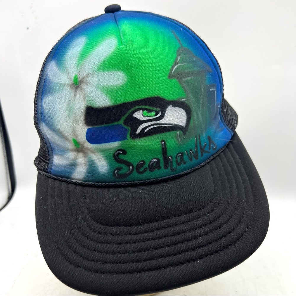 KC Seattle Seahawks are all cap. SnapBack logo and flowers on front Mesh back